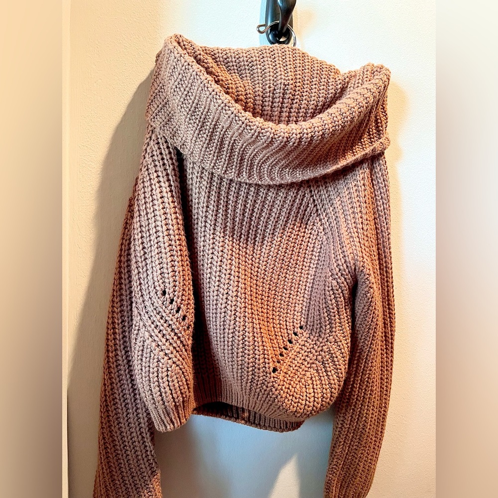 Brown turtleneck.